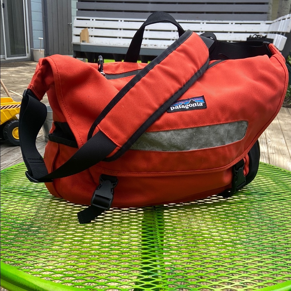 Patagonia Orange Messenger Bag with Reflective Strips and Adjustable Straps